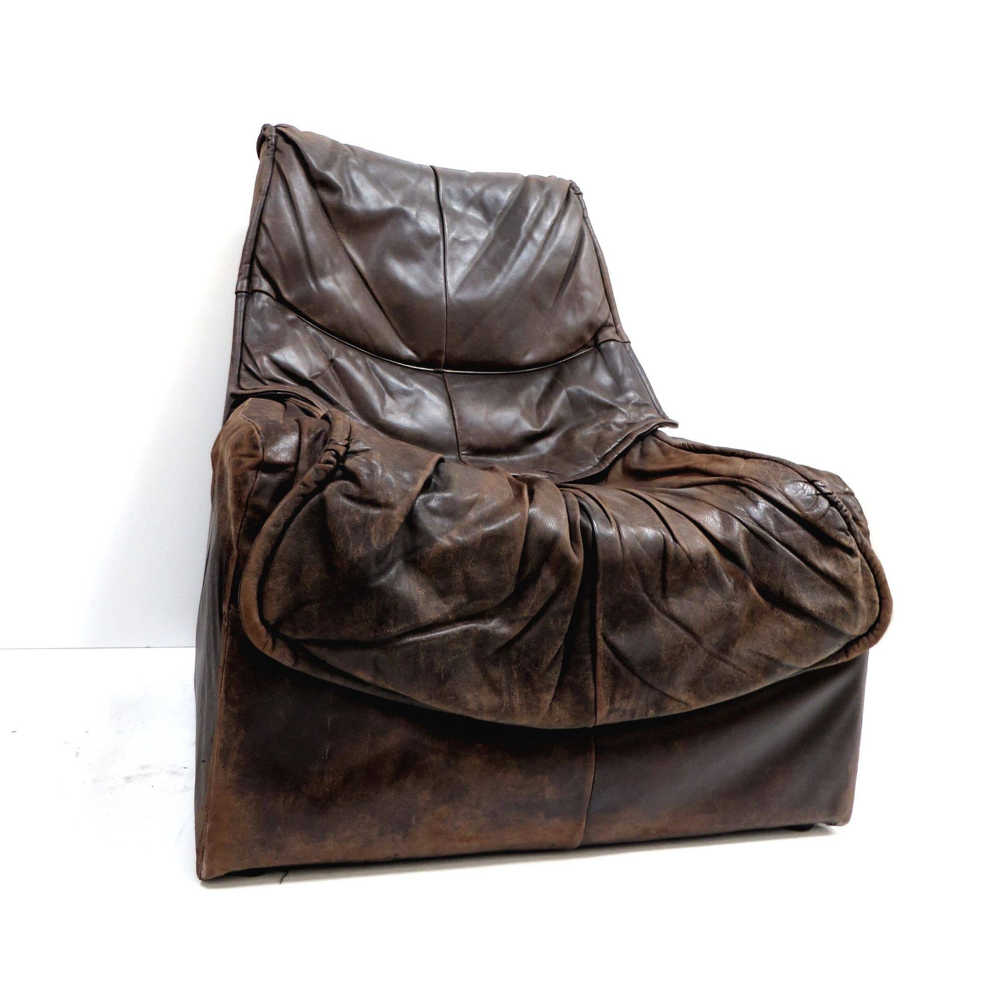 Vintage leather Brutalist armchairs