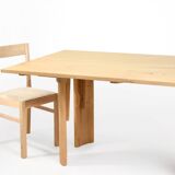 Solid oak dining table, seats 8 people.