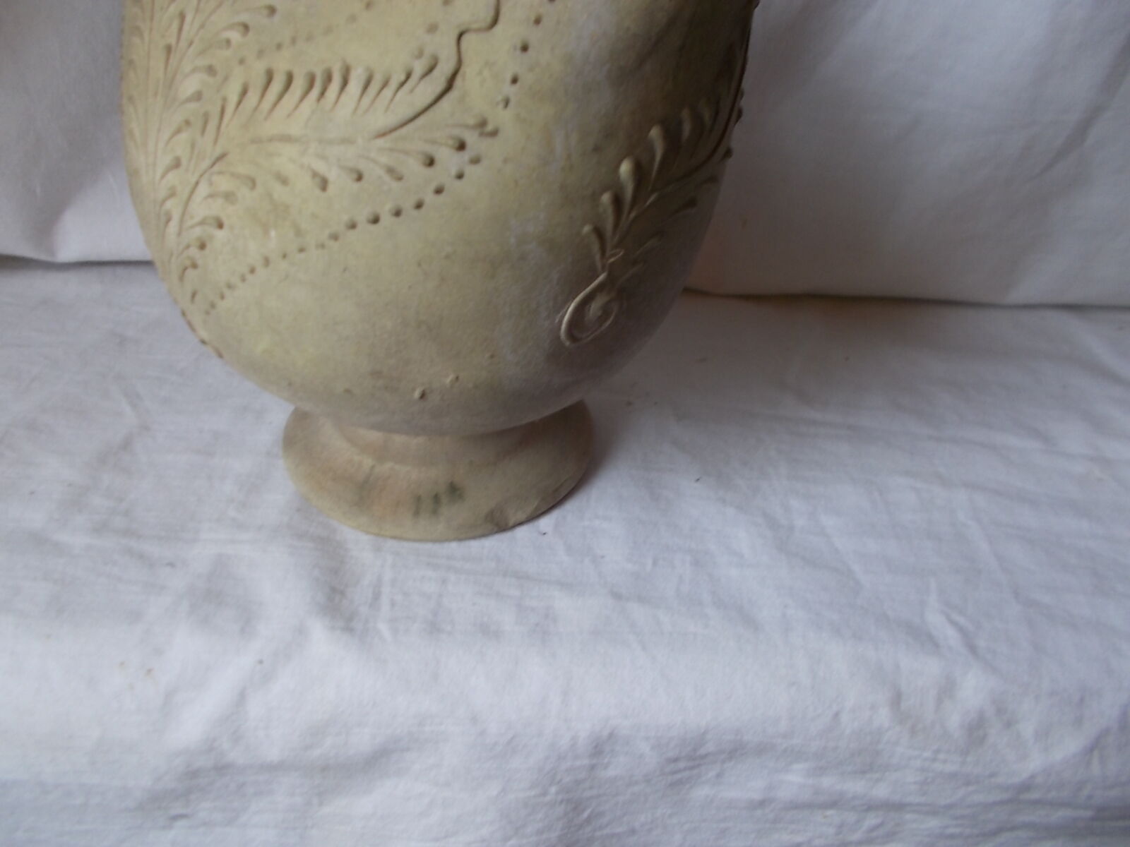Old grey terracotta jug