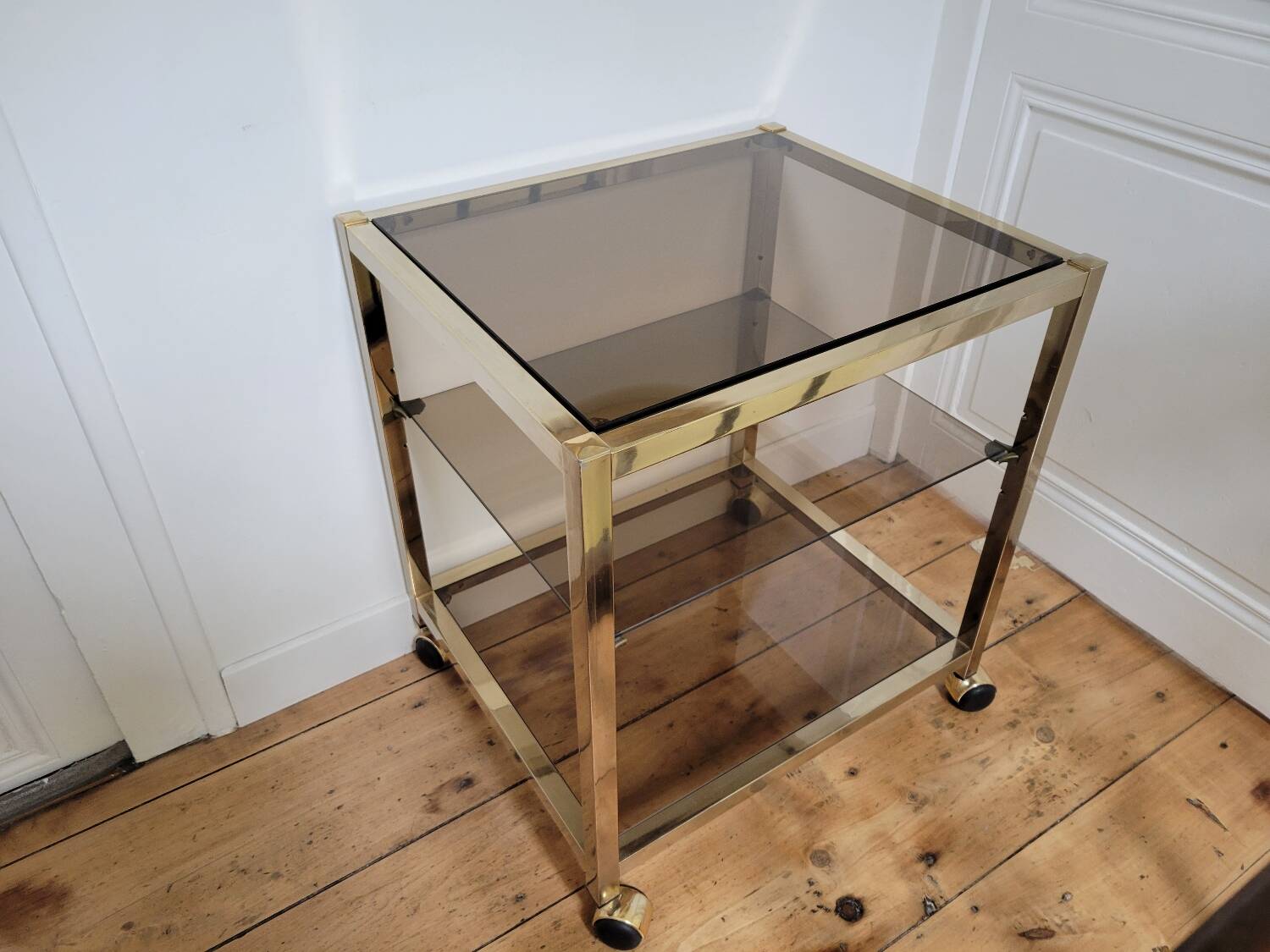 Gold metal and smoked glass serving trolley