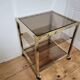 Gold metal and smoked glass serving trolley