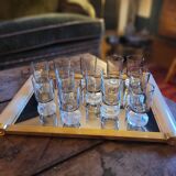 12 smoked glass stemmed glasses from the 70s and 80s.