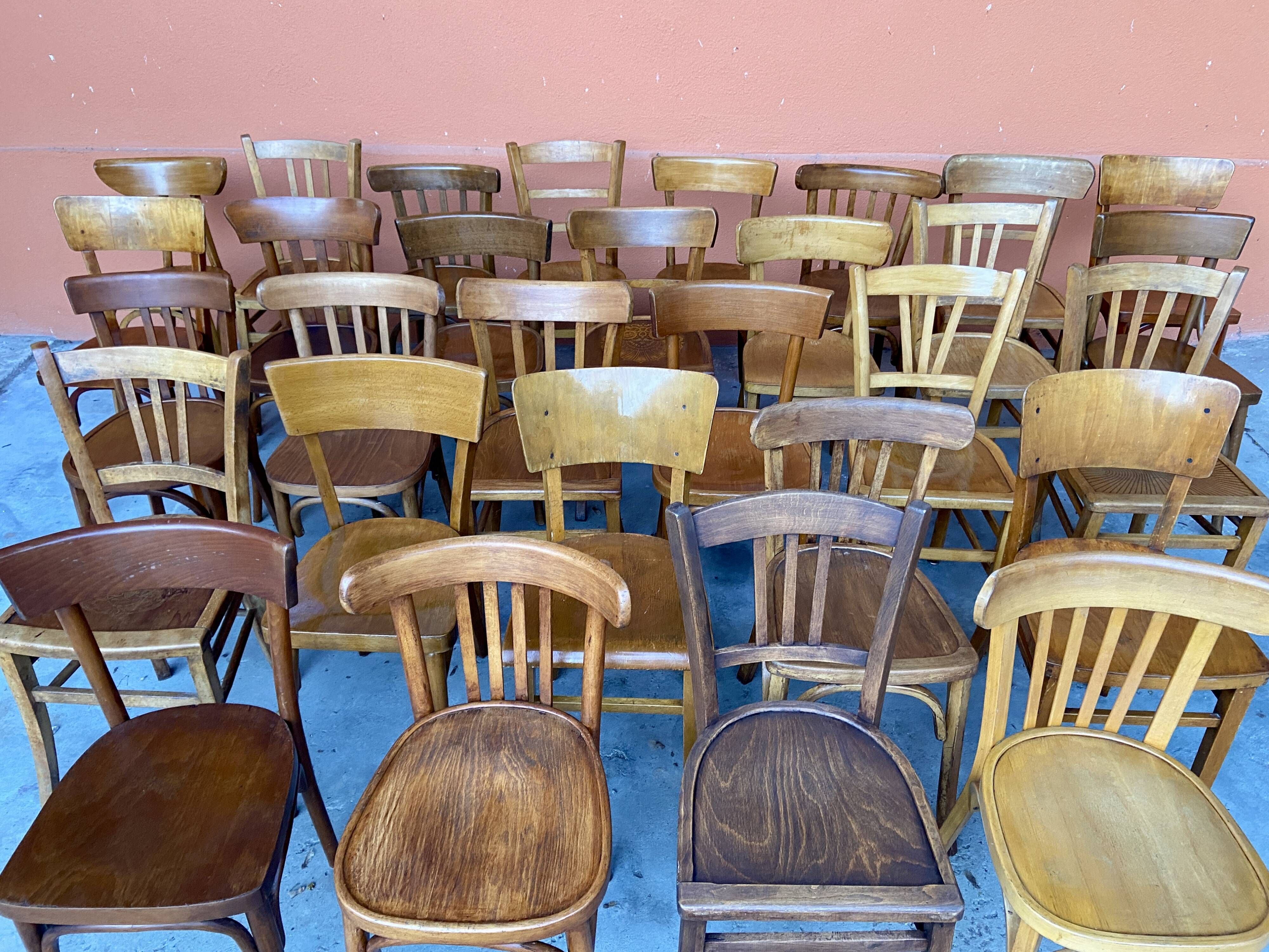 Set of 30 mismatched bistro chairs French Restaurant curved wood