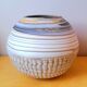Mixed earth ceramic vase signed