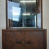 Art Deco period bookcase in lacquered wood with a faux appearance of rust-patinated sheet metal circa 1930-1940