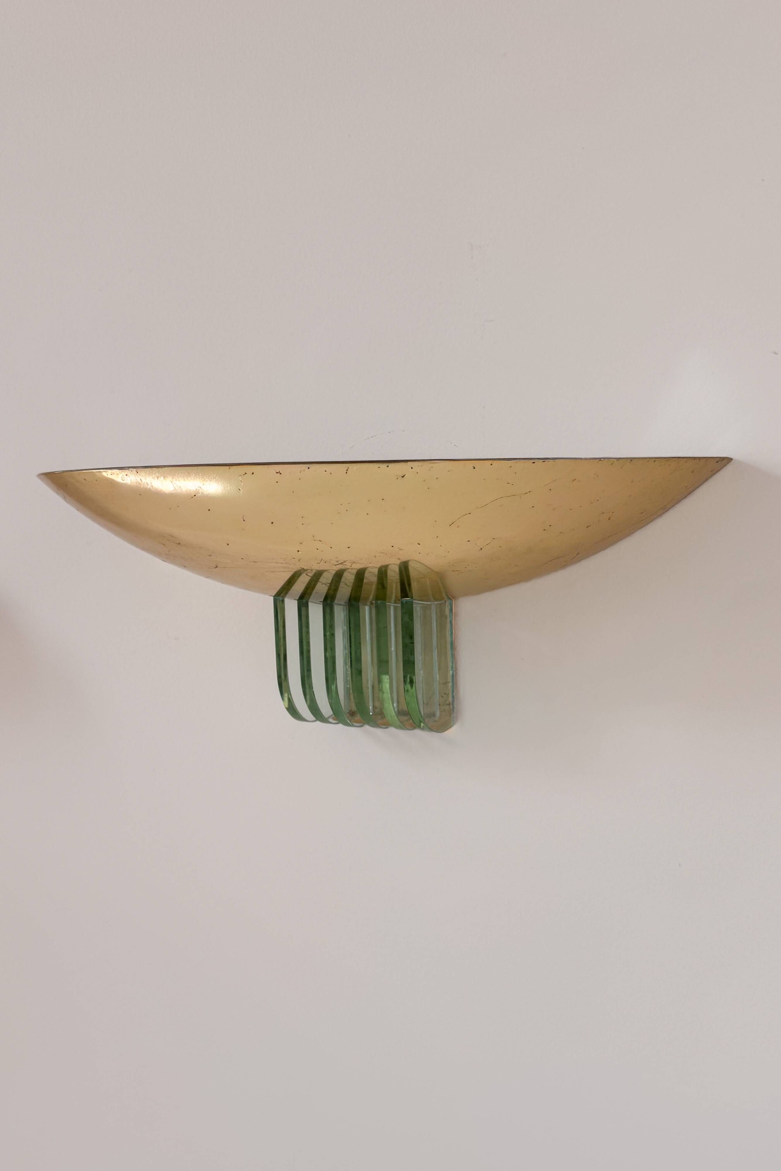 Pair of vintage brass and glass wall lights, France 1970.