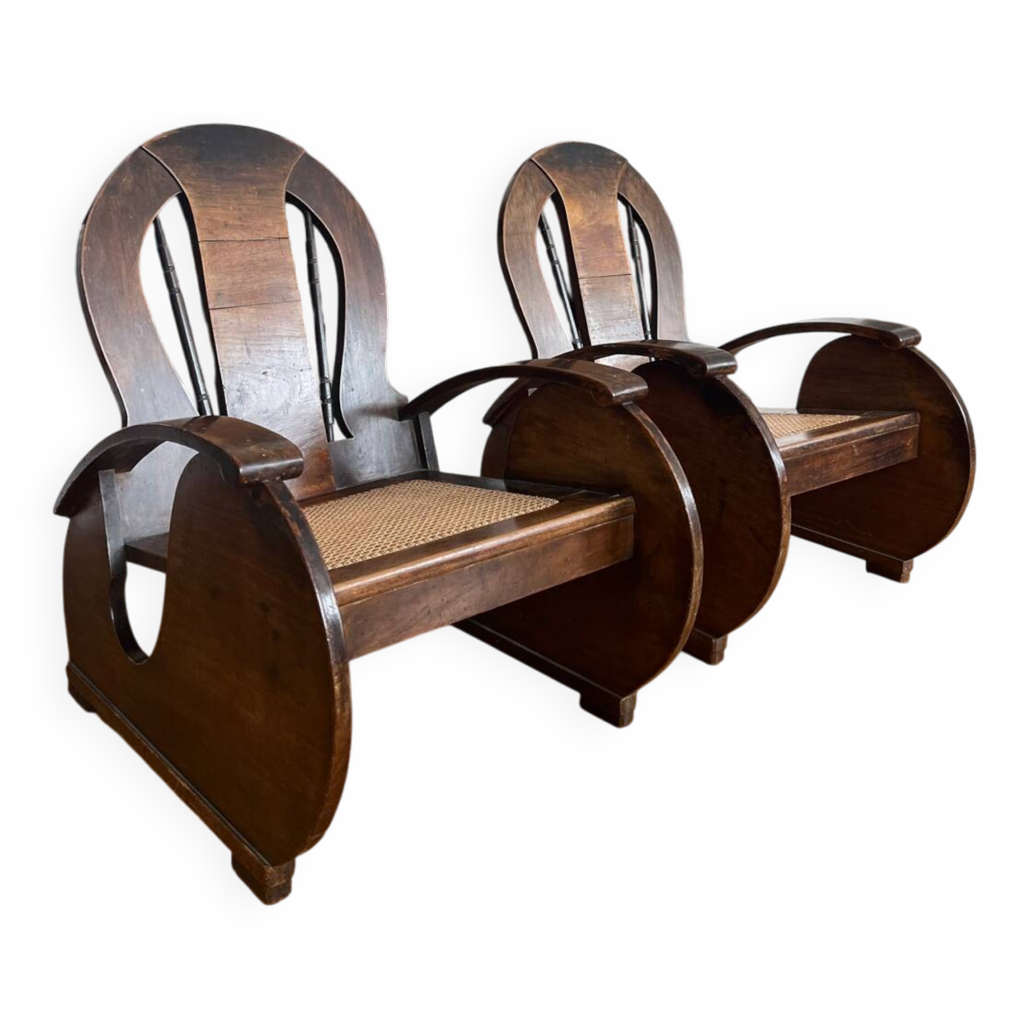 Pair of Art Deco armchairs in wood and cane.