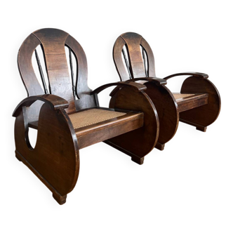 Pair of Art Deco armchairs in wood and cane.