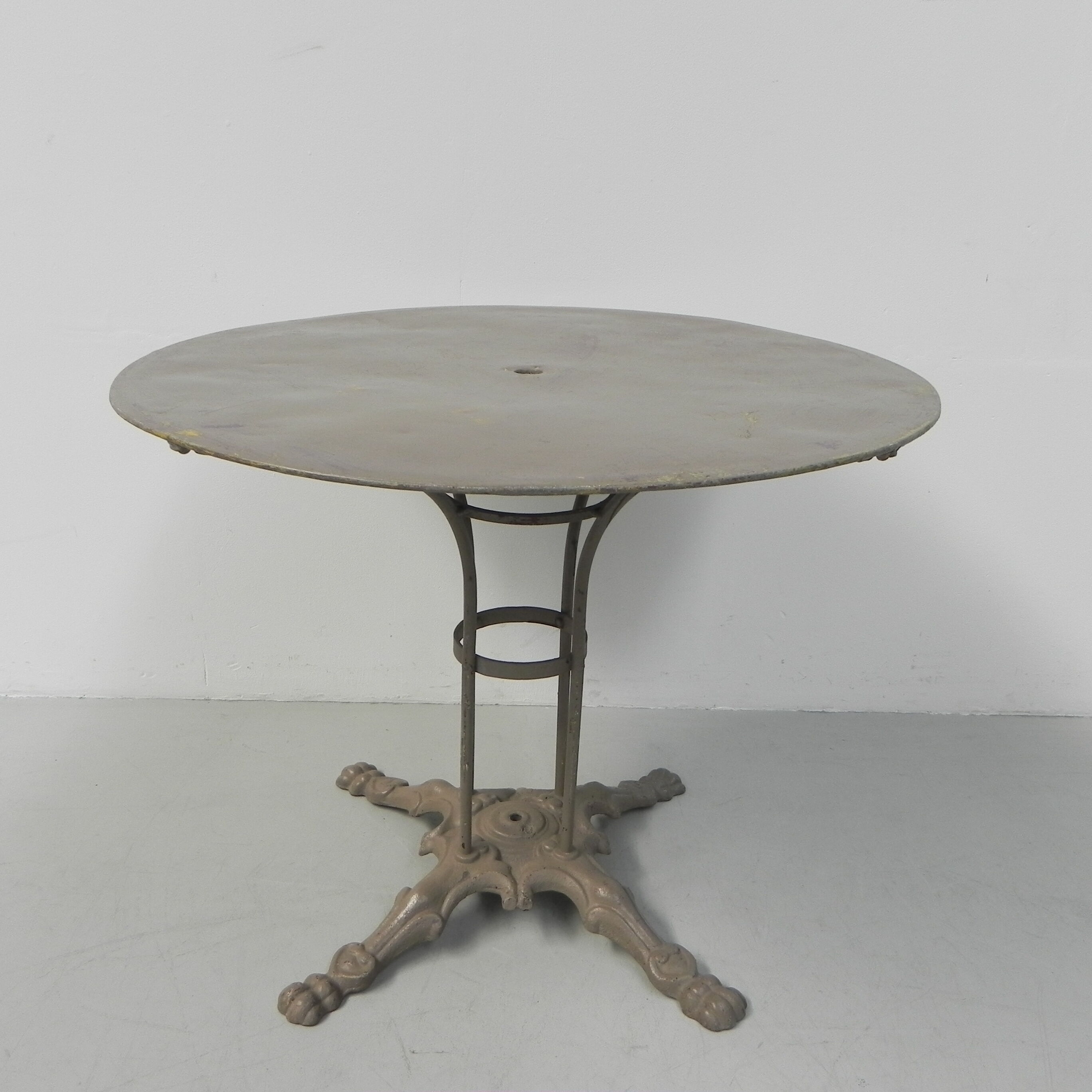 Steel garden table on cast iron base