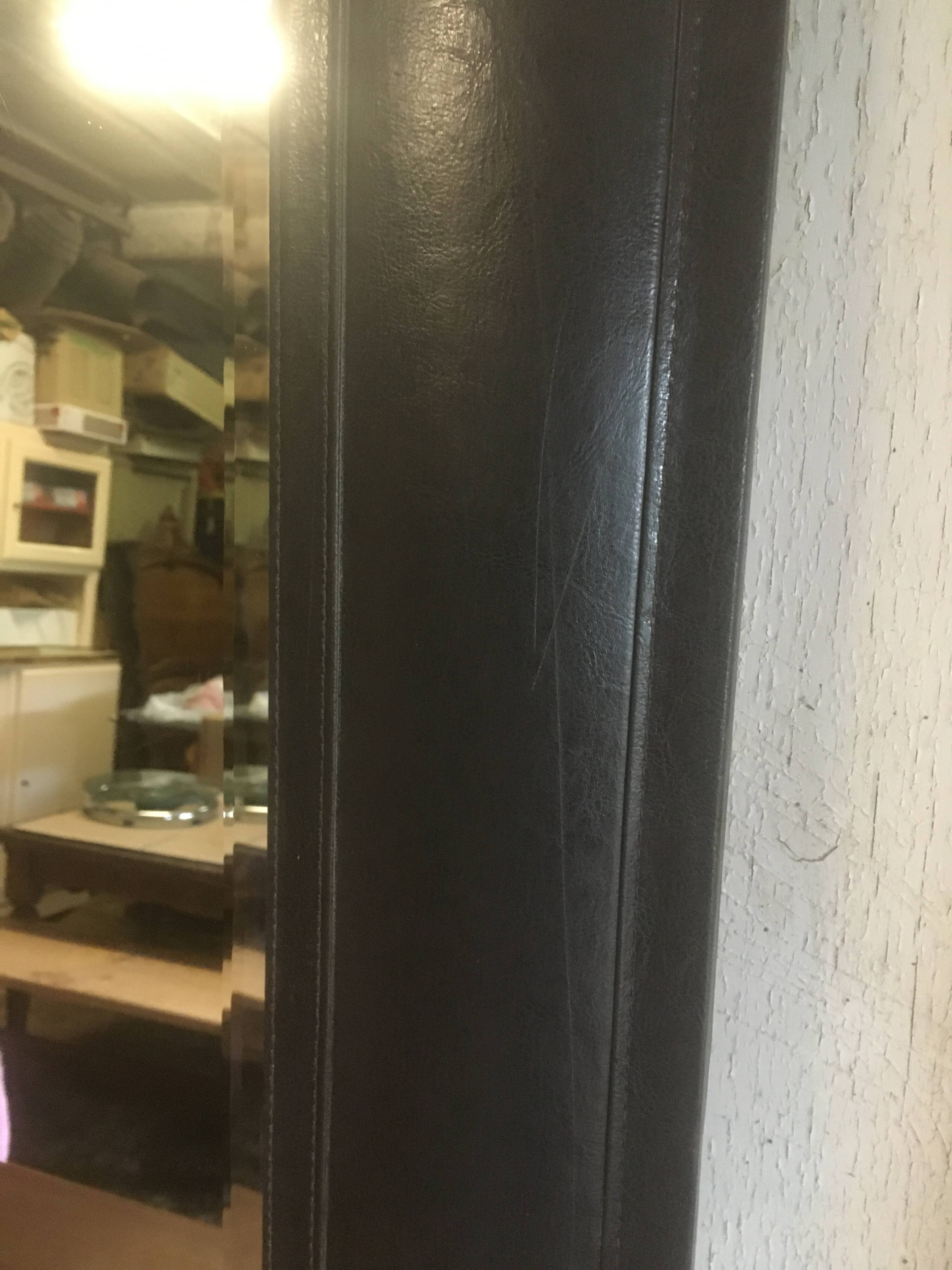Beveled leather mirror 90x70