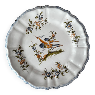 Decorative earthenware plate from Moustiers