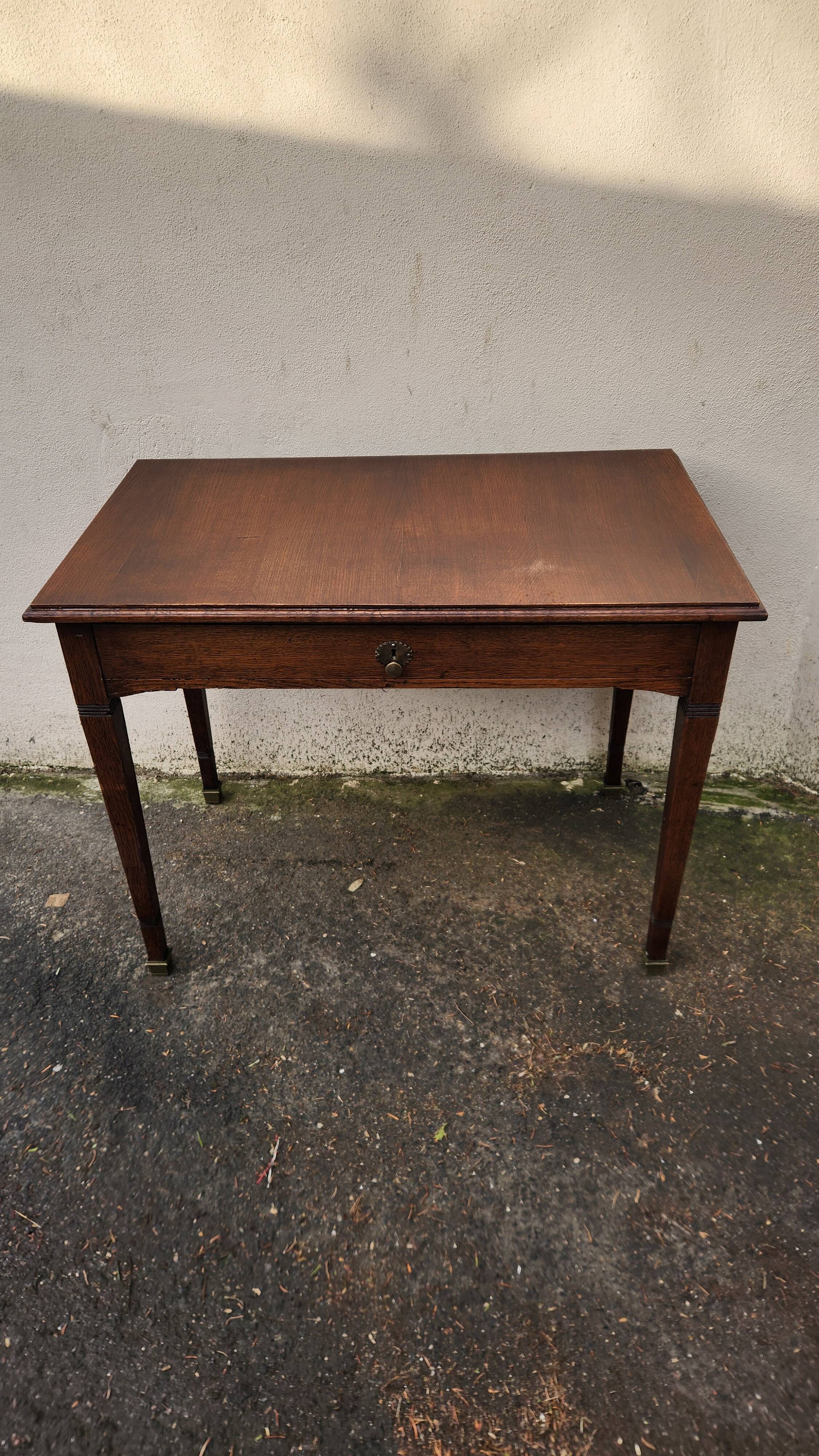 Vintage wooden desk from the 19th century, Louis XVI style.
