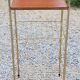 Bedside table from the 50s in gold metal and blond mahogany