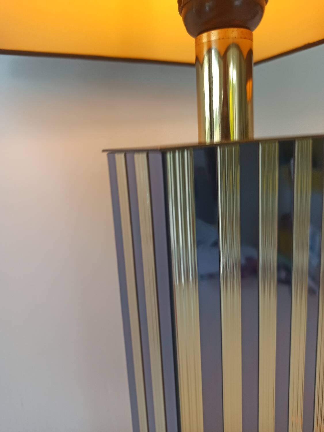 Pair of black and gold art deco style lamps