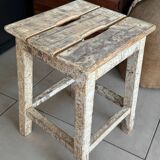 Old wooden stool with square seat
