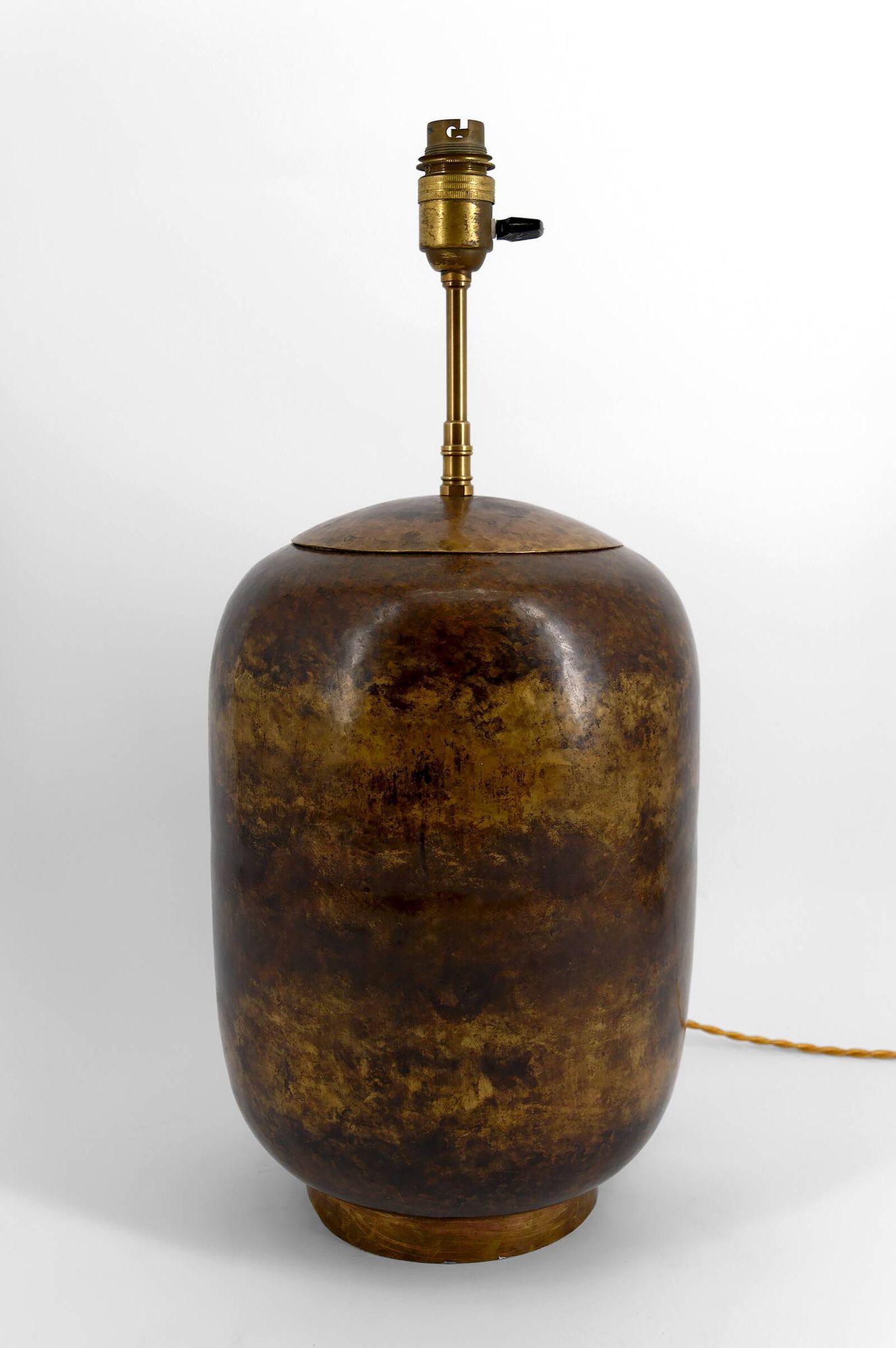 Art Deco modernist lamp in patinated brass, circa 1930.