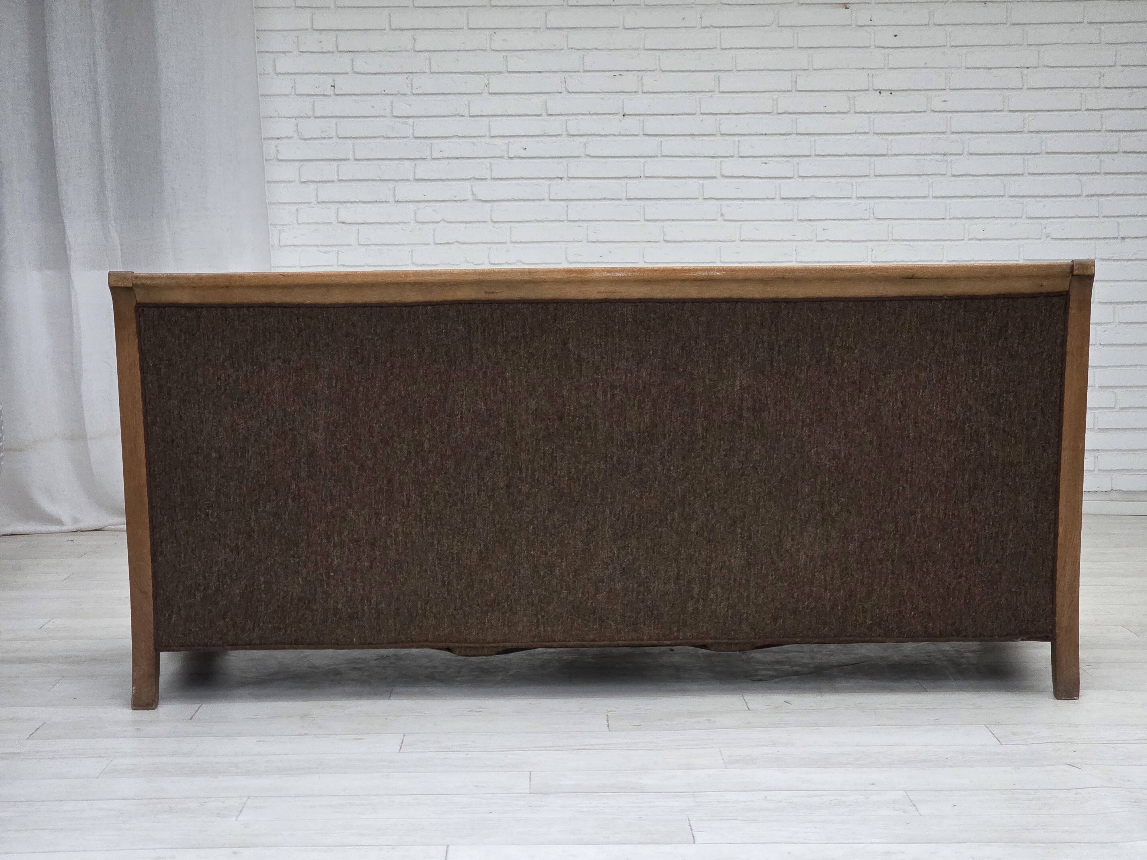 1950s, Danish 3-seater sofa, furniture wool, solid carved oak wood.