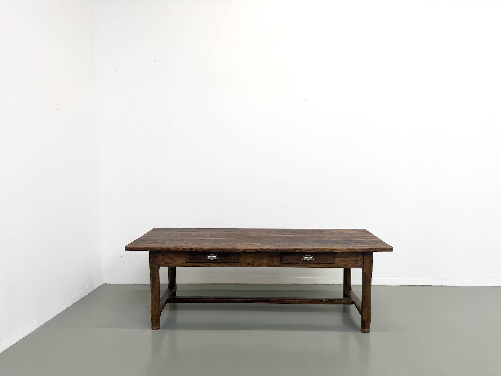Authentic French farmhouse table from 1890 in solid oak with two drawers.
