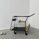 Perforated metal serving trolley in the Mathieu Matégot style