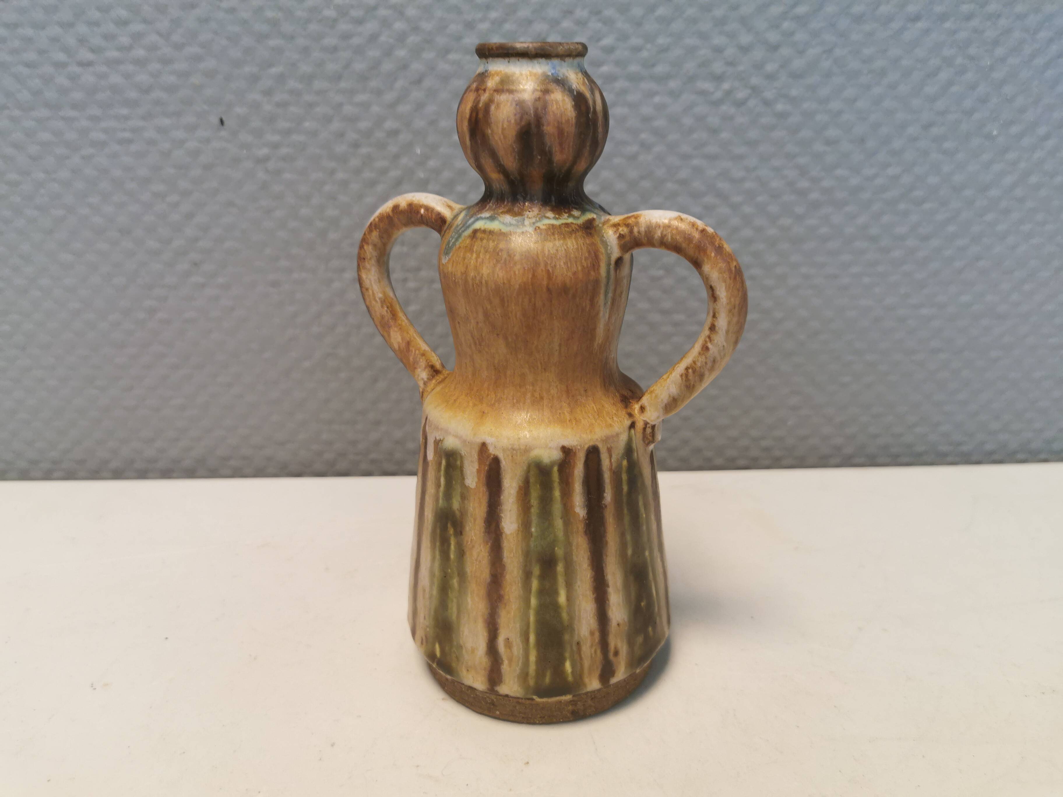 Beautiful ceramic vase in the shape of a lady, in multicolored glaze. Denmark 1970-80s