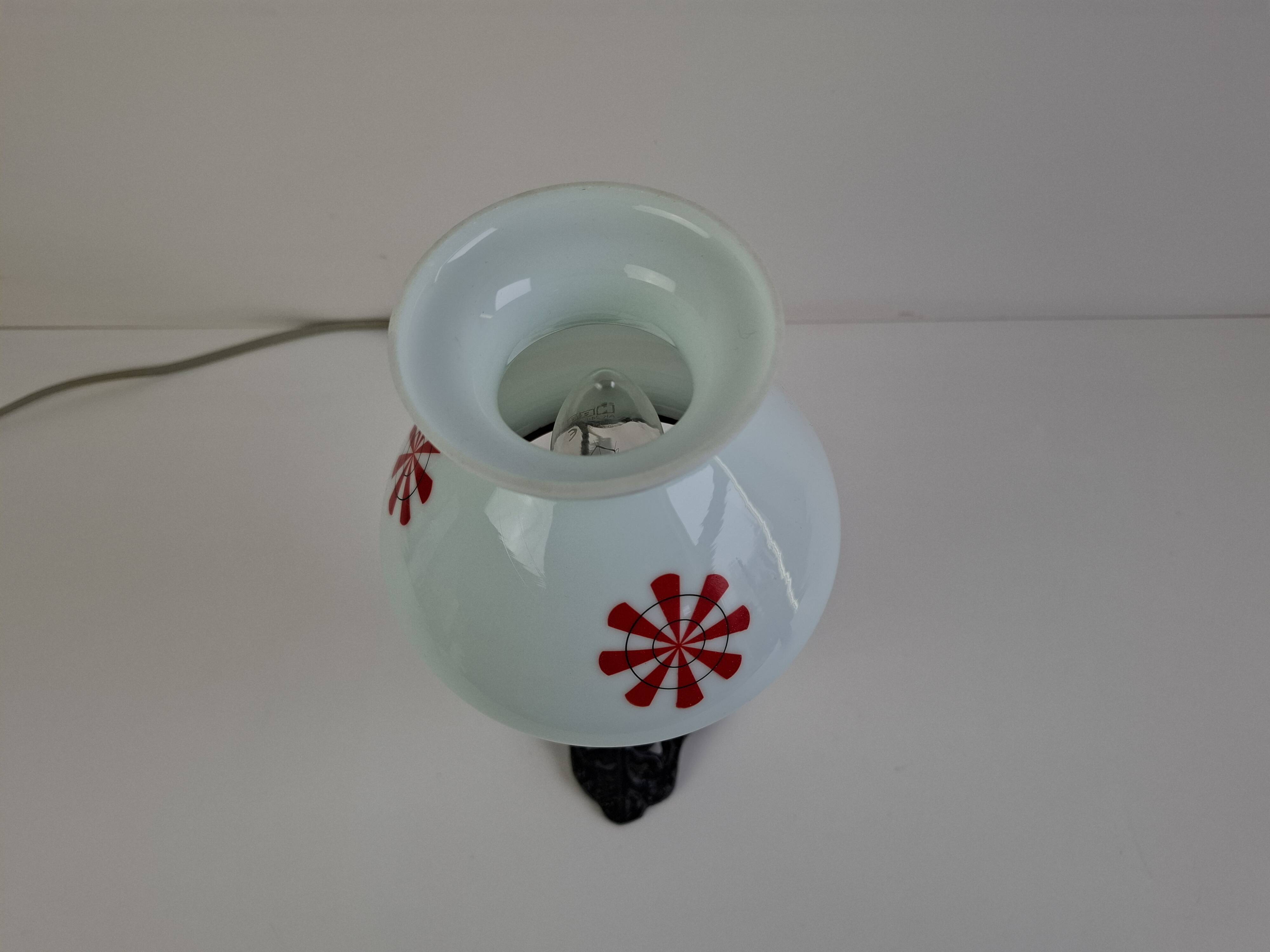 1960s Czechoslovakian milk glass oil lamp style table lamp with red windmill