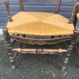 Pair of blackened wooden armchairs