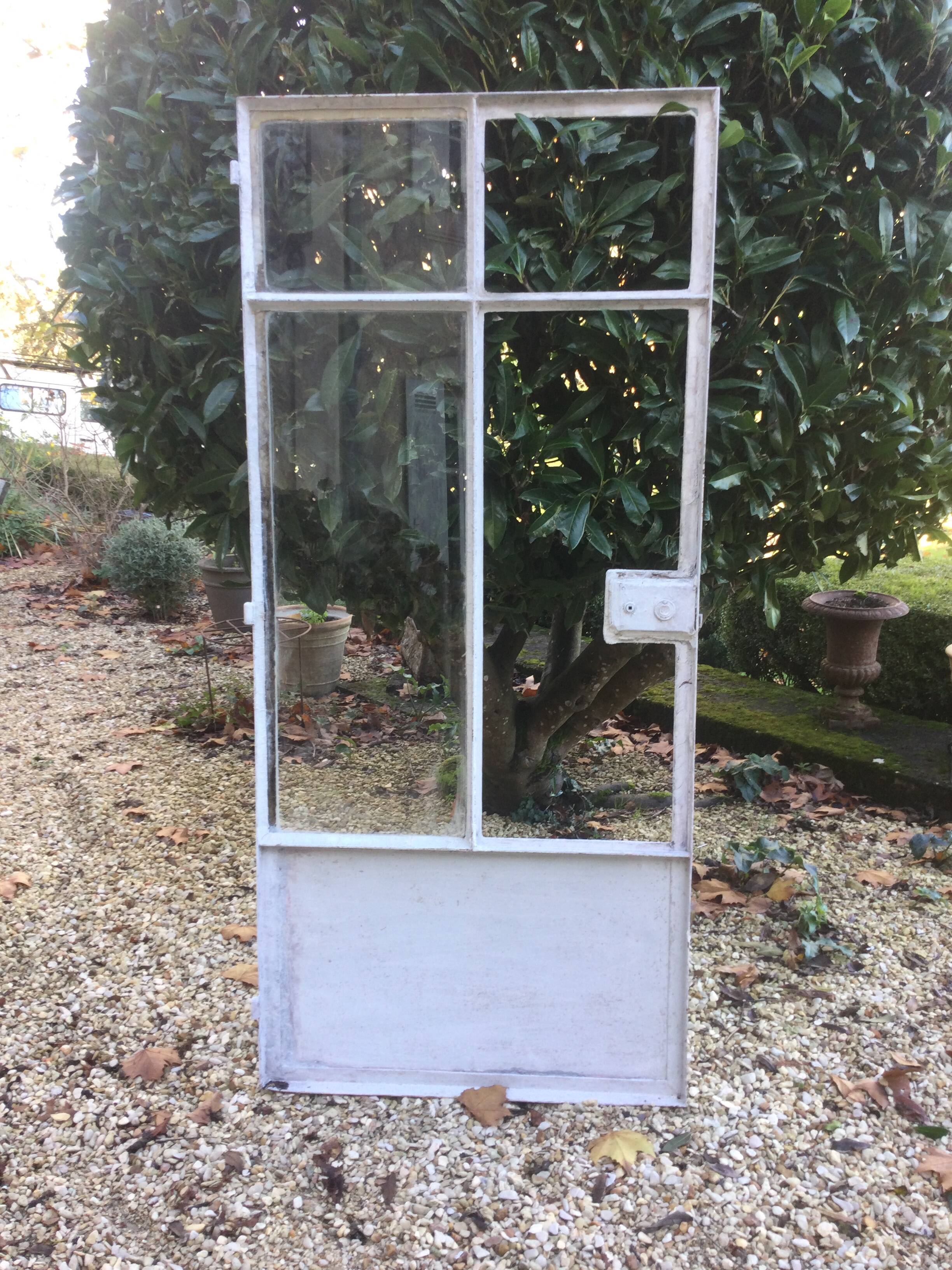 Old glass roof with door and window