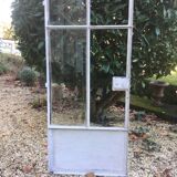 Old glass roof with door and window