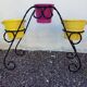 Black wrought iron plant holder