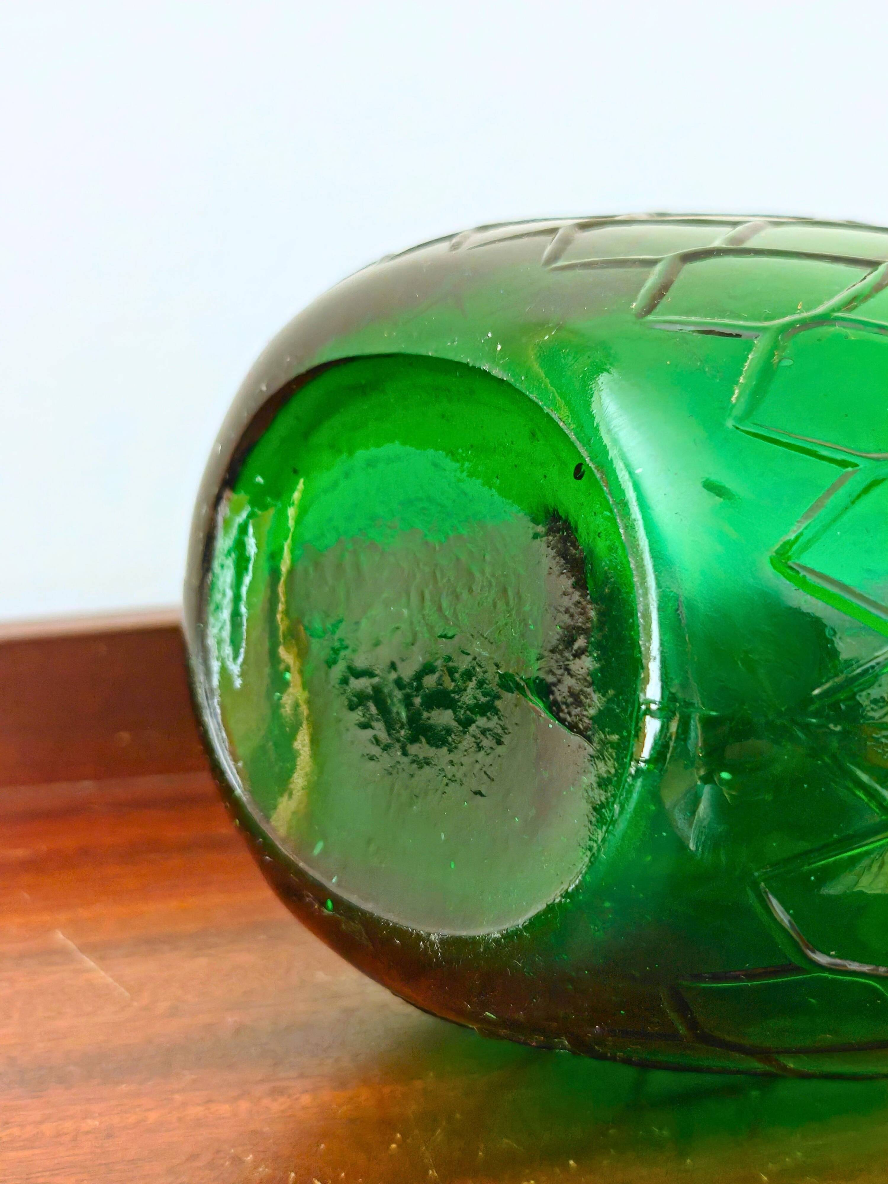 Italian carafe Empoli in iridescent green with diamond pattern.