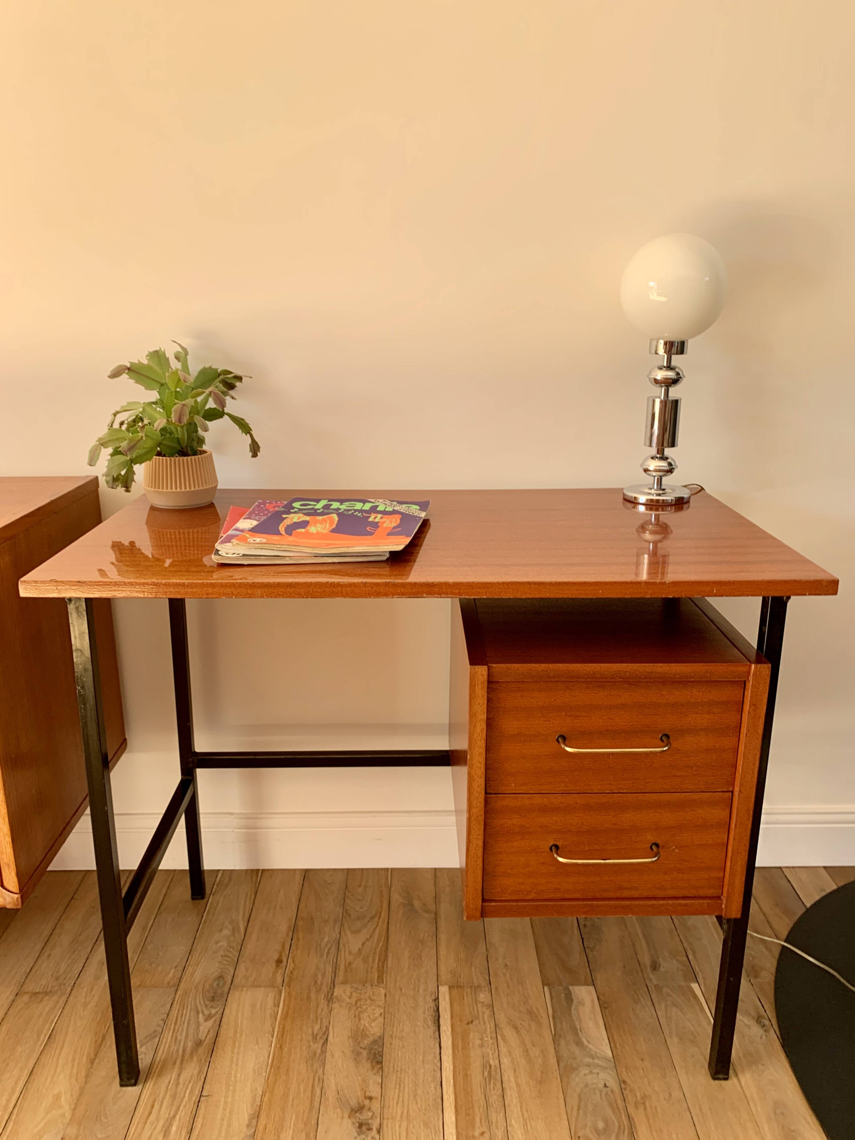 lacquered wood desk and black steel legs design from the 60s and 70s