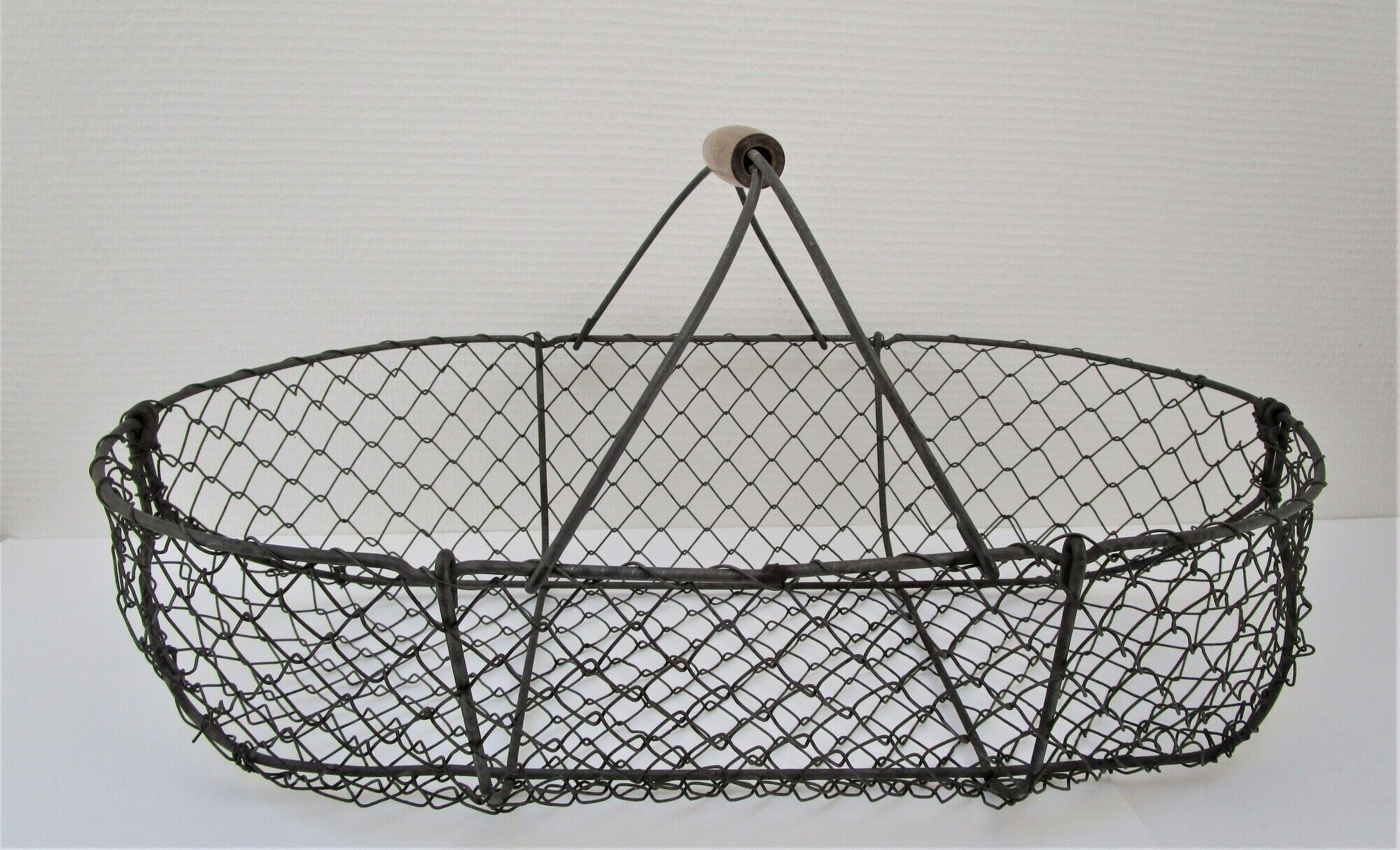 Two baskets metal and patinated wood early twentieth century