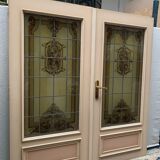 Wooden doors with stained glass