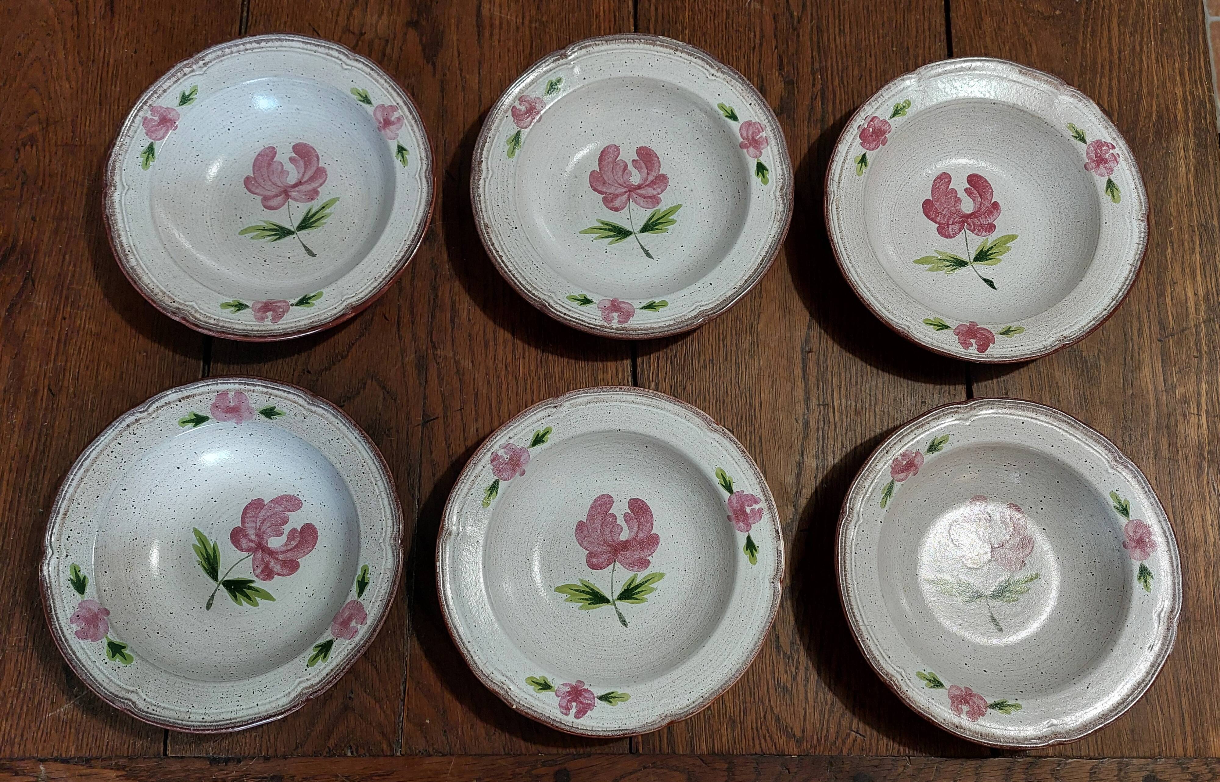 Deep plates series of six Niderviller stoneware, 20th century Cassandre decoration