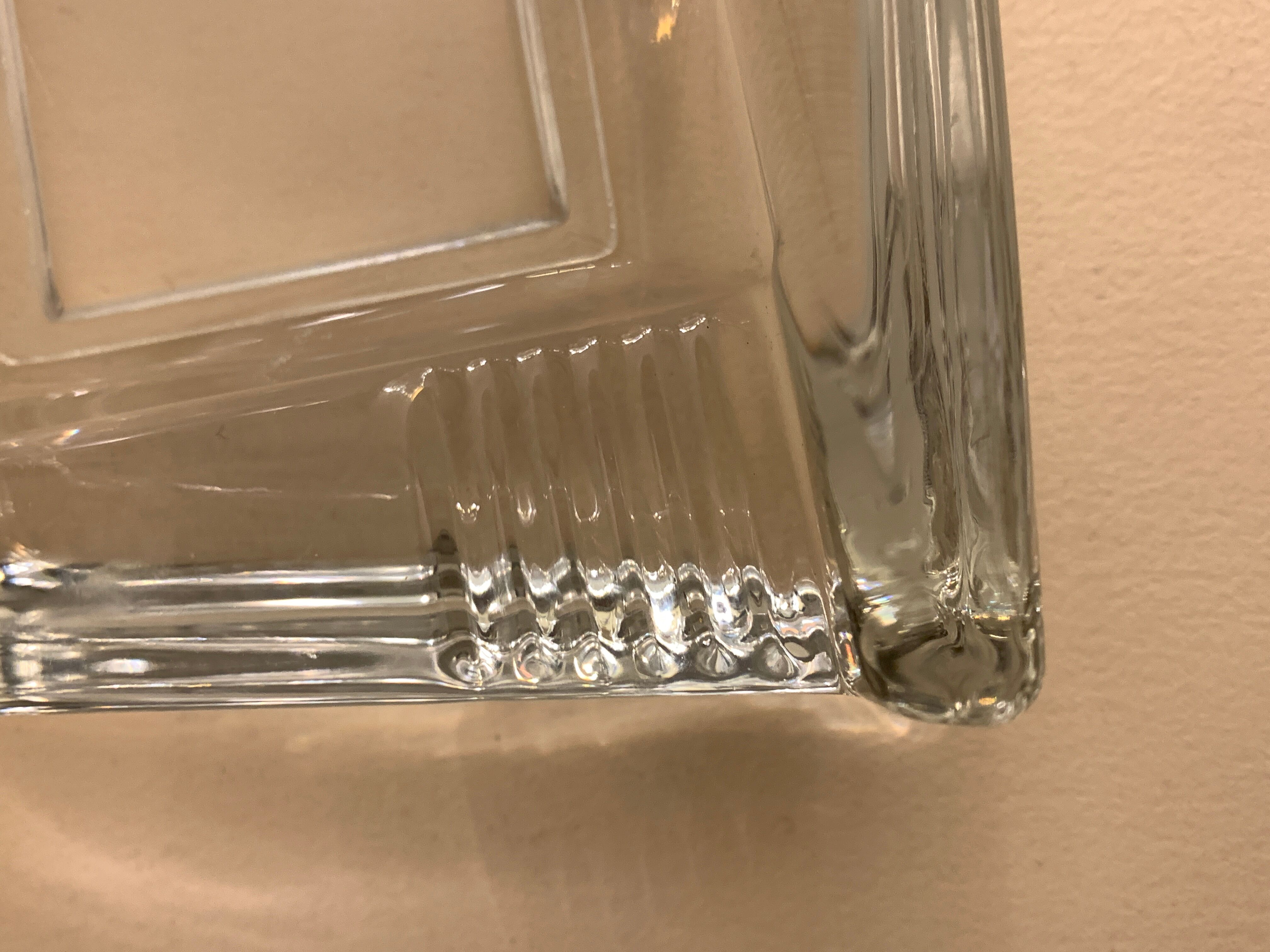 Transparent moulded glass ashtray