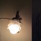Old wall lamp in bronze and glass