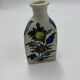 Trilobe enameled earthenware bottle, Persia, Iznik, 19th century