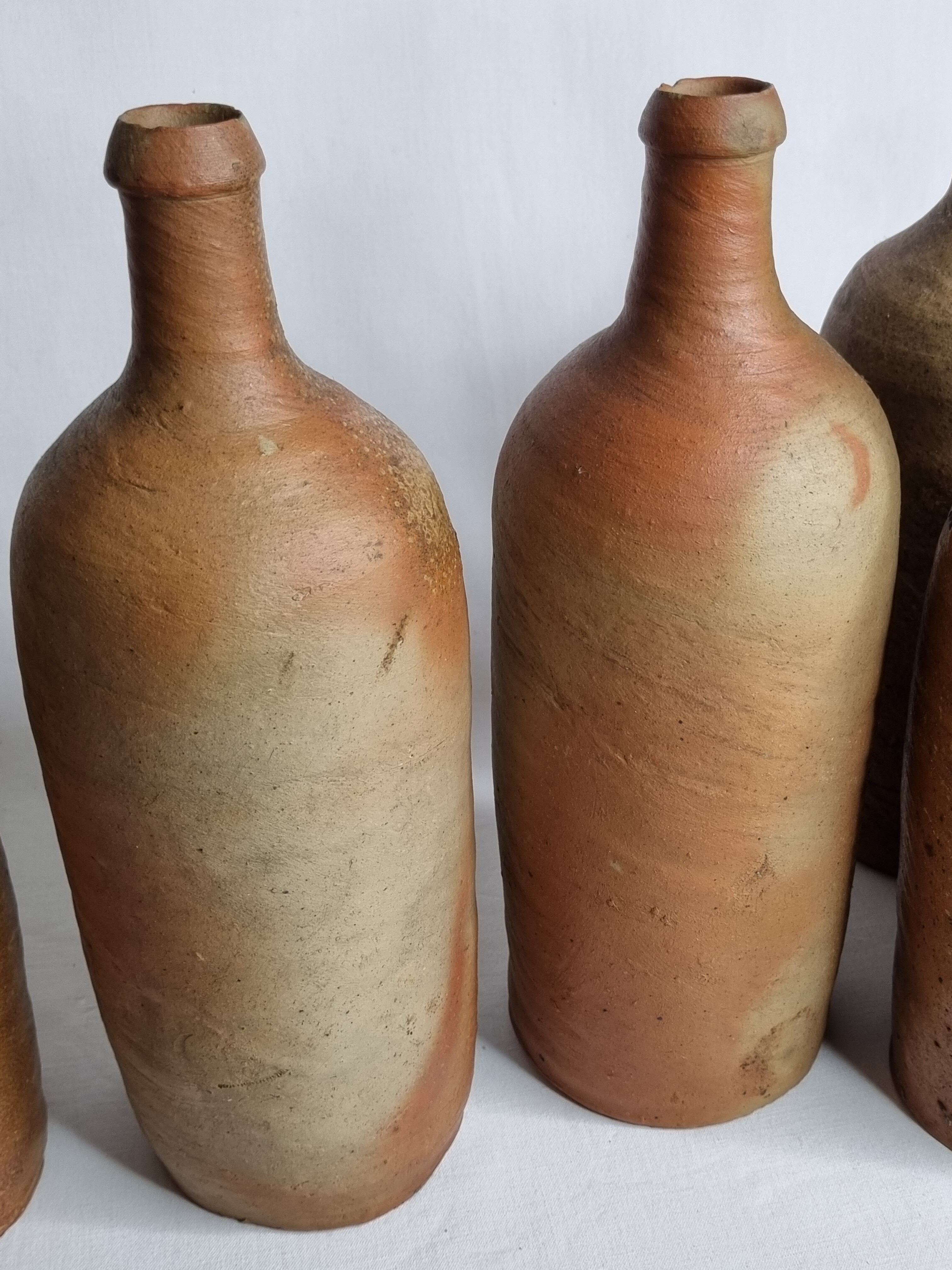 Set of 6 hand-turned stoneware bottles, 31 cm
