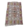 Tapis kilim gris motifs gazelles fait main traditionnel