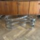 Table basse ovale design années 70 en verre et pieds chromé « S »