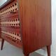Teak and rattan chest of drawers feet compass