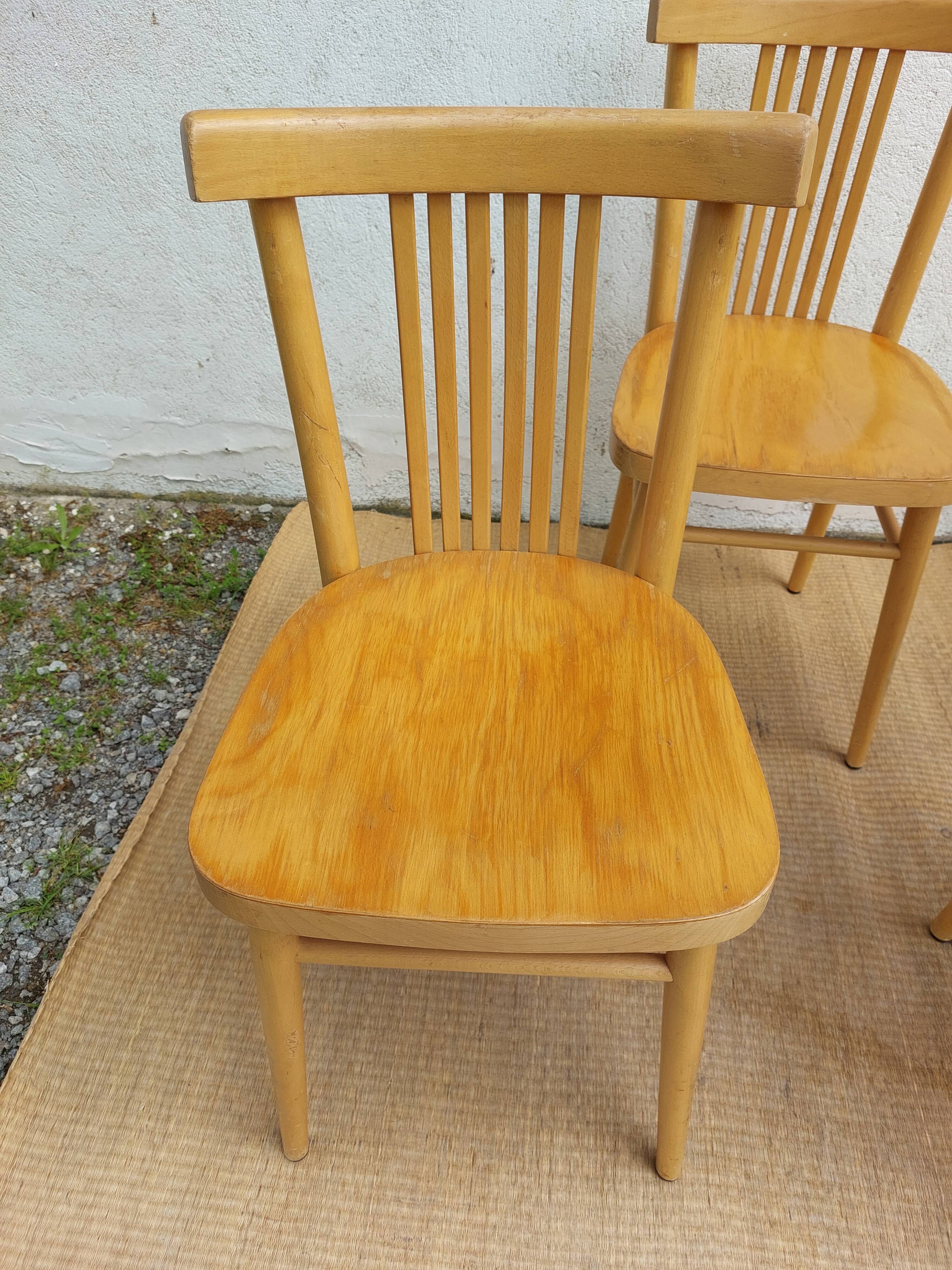 4 light wood bistro chairs
