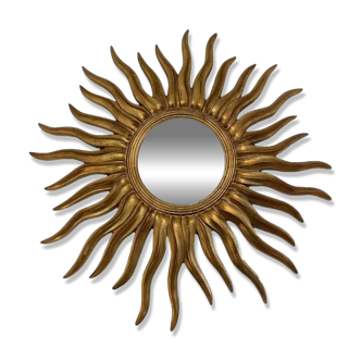 Large witch's eye mirror with sunburst design, diameter 110cm