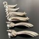 6 various animal shaped knife holders in silver metal