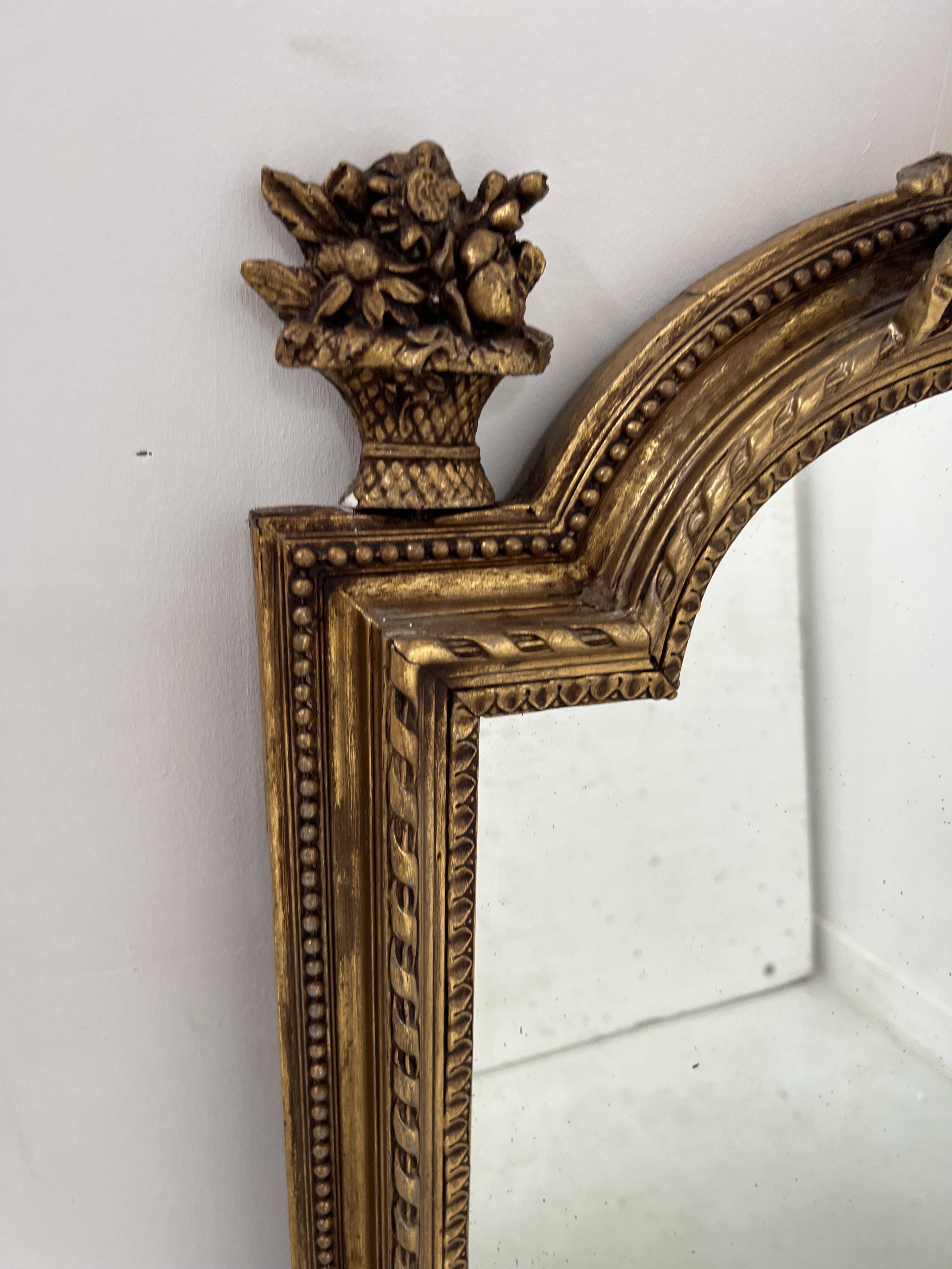 Louis XVI style mirror in wood and gilded stucco, 19th century