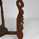 Asian coffee table carved with dragons and peacocks, Indonesia, early 20th century