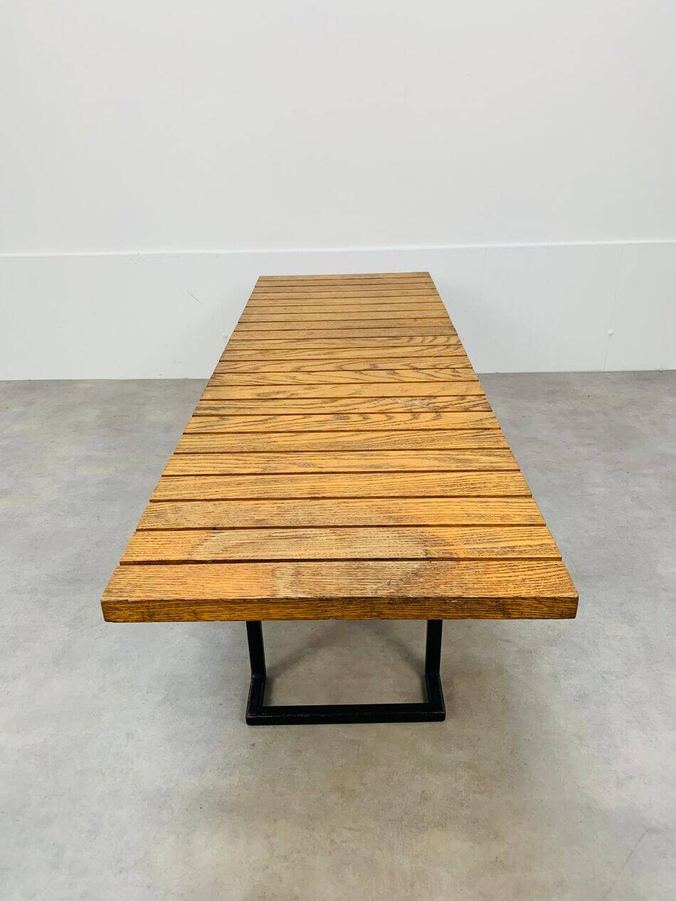 1950s coffee table in the style of Alain Richard, wood and metal.