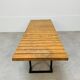 1950s coffee table in the style of Alain Richard, wood and metal.