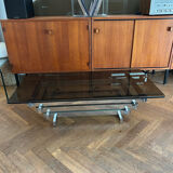70s design coffee table in rectangular glass with chrome legs.