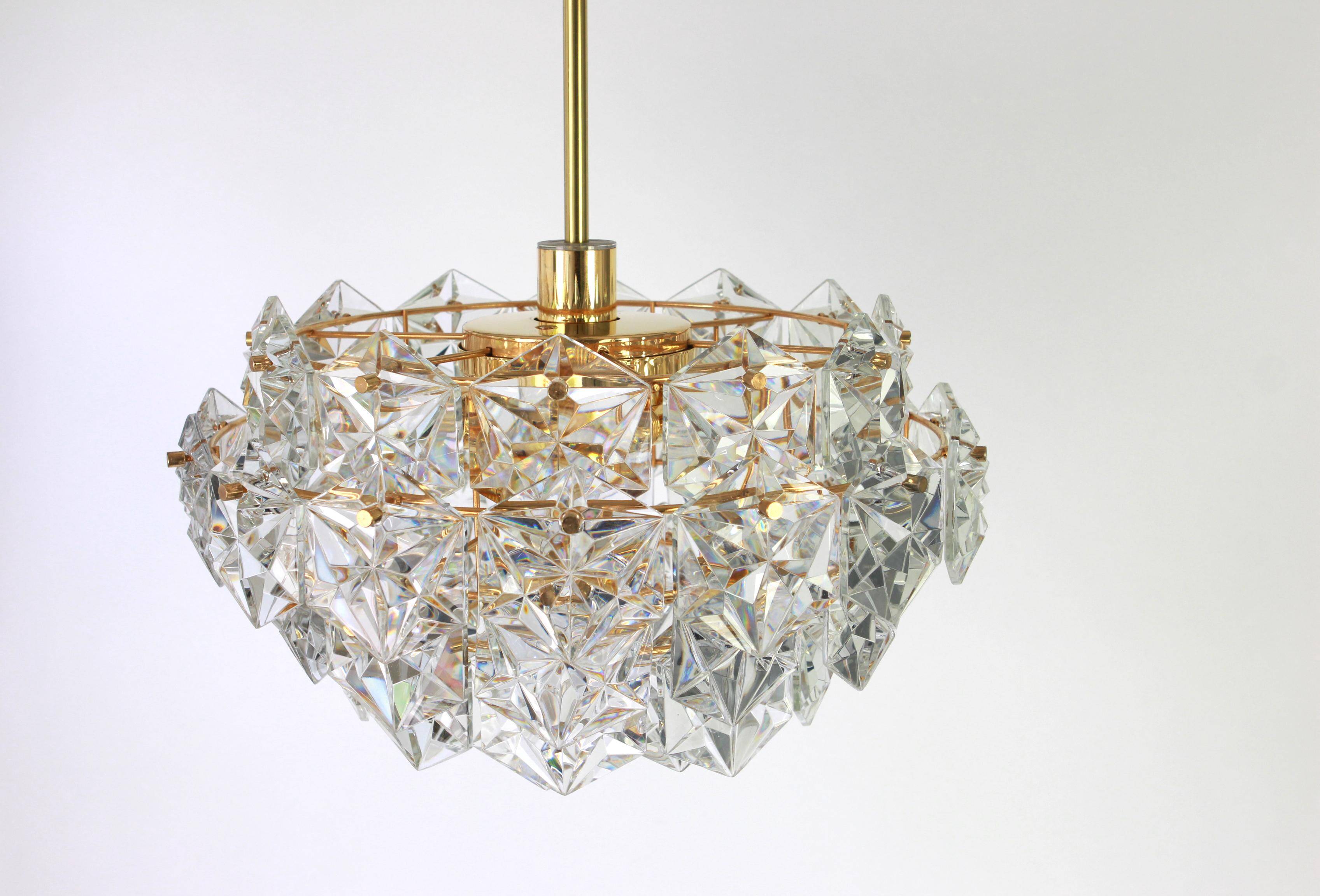 Chandelier in gilded brass and crystal glass by Kinkeldey, Germany, 1970s.